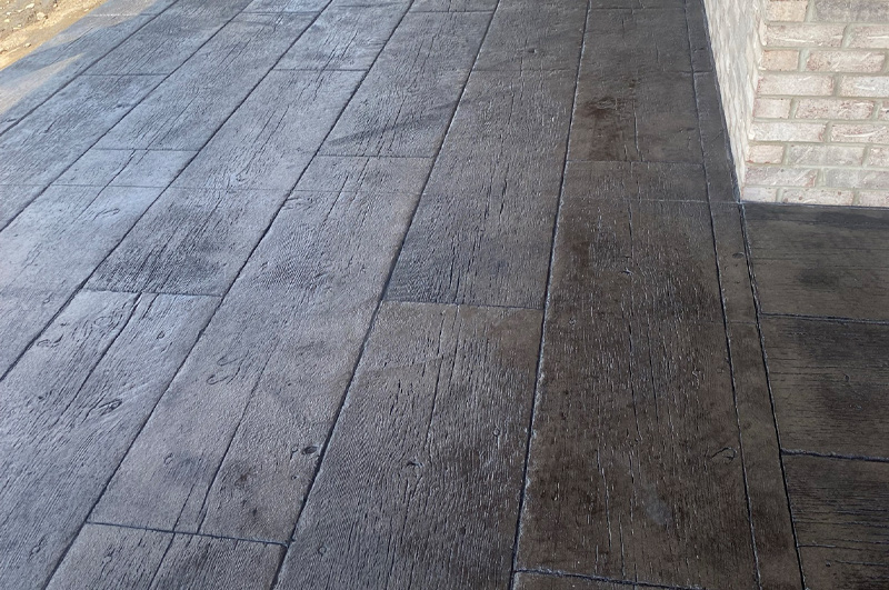 Wood-pattern stamped concrete patio installed in Mongo, Indiana by Marc Todd Concrete